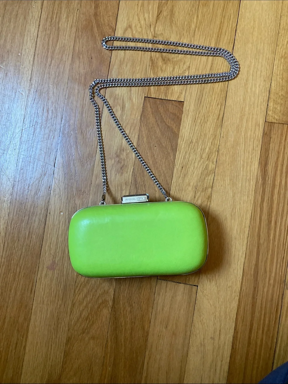 Michael Kors Lime Green Chain Strap Clutch with white bag protector